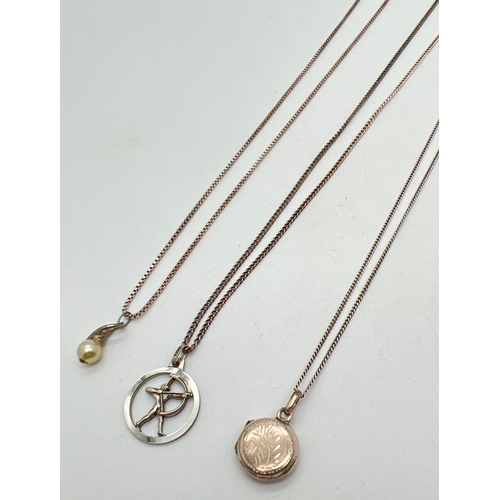 1087 - 3 silver & white metal pendant necklaces. A 925 silver small circular locket on an 18