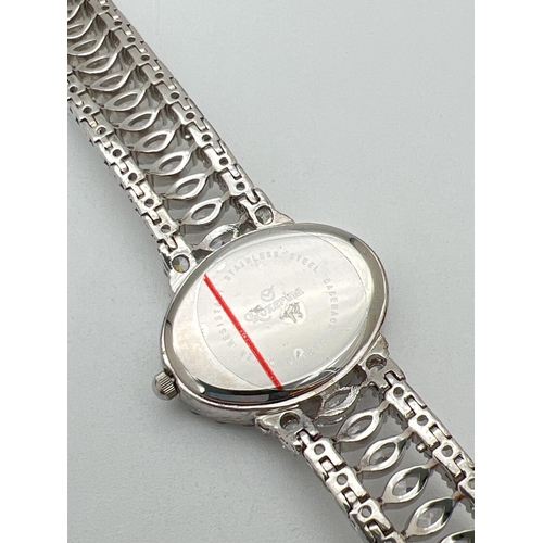 1162 - A ladies quartz wrist watch by Roxerina. Strap set with multiple marquis cut and round cut clear sto... 