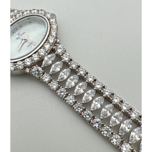 1162 - A ladies quartz wrist watch by Roxerina. Strap set with multiple marquis cut and round cut clear sto... 