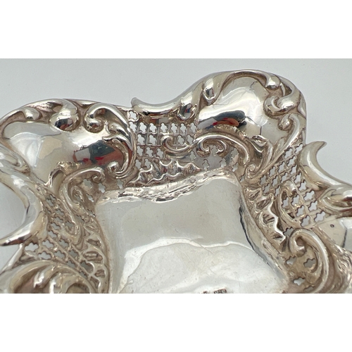 1171 - A late Victorian silver square shaped pin dish with decorative scroll & pierced work rim. Fully hall... 