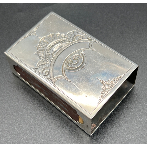 1168 - A vintage Art Nouveau style Dutch silver match box holder with floral detail to both sides and empty... 