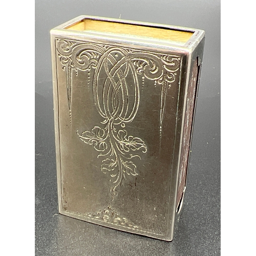 1168 - A vintage Art Nouveau style Dutch silver match box holder with floral detail to both sides and empty... 