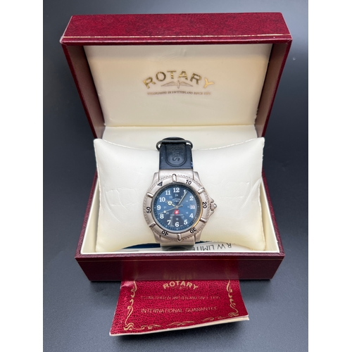 1138 - A boxed Swiss Commando wristwatch by Rotary. Blue leather strap and stainless steel case and metalli... 