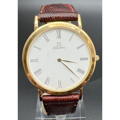 1147 - A vintage 28/27.400.615 men's wristwatch by Zenith.  Gold tone case and buckle white face and brown ... 