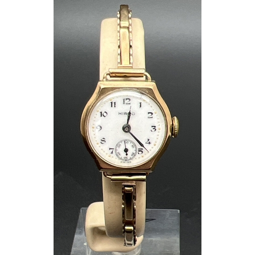 A vintage ladies 9ct gold cocktail watch with expanding bracelet strap ...