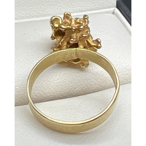 1050 - A bespoke made abstract gold nugget dress ring. No hallmarks to ring. Nugget tests as 18ct and band ... 