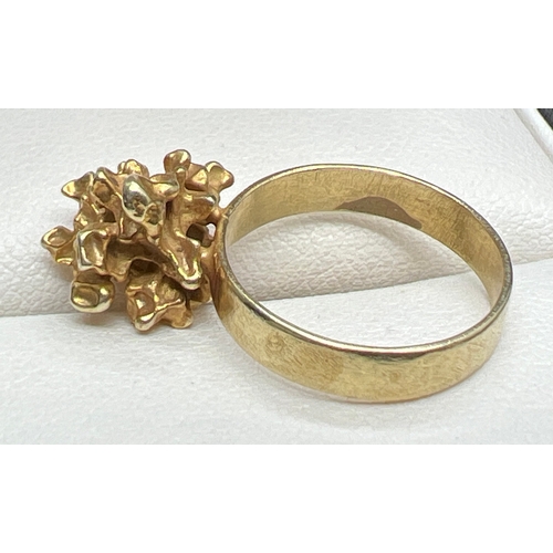 1050 - A bespoke made abstract gold nugget dress ring. No hallmarks to ring. Nugget tests as 18ct and band ... 