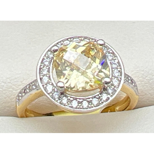 1057 - A 14ct gold plated cocktail ring set with Swarovski crystals, new with tags. Halo set cushion cut ce... 