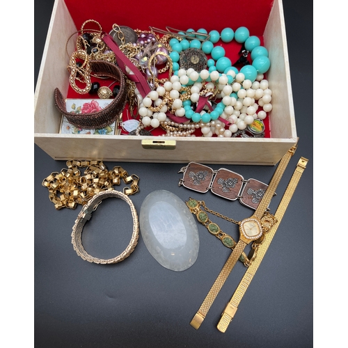 1061 - A large vintage cream coloured jewellery box and contents to include gold tone and beaded jewellery ... 