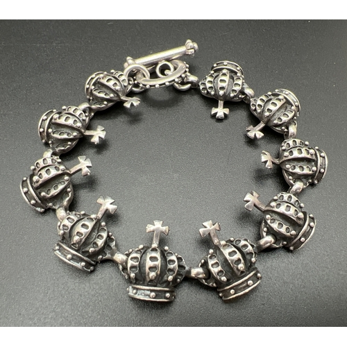 1073 - A heavy 925 sterling silver crown and cross design panel bracelet in the style of Vivienne Westwood.... 