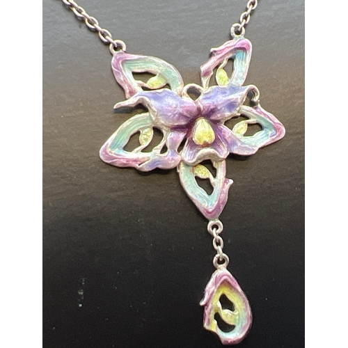 1074 - An Art Nouveau enamelled white metal fixed pendant necklace with ornate floral panels. With push bar... 