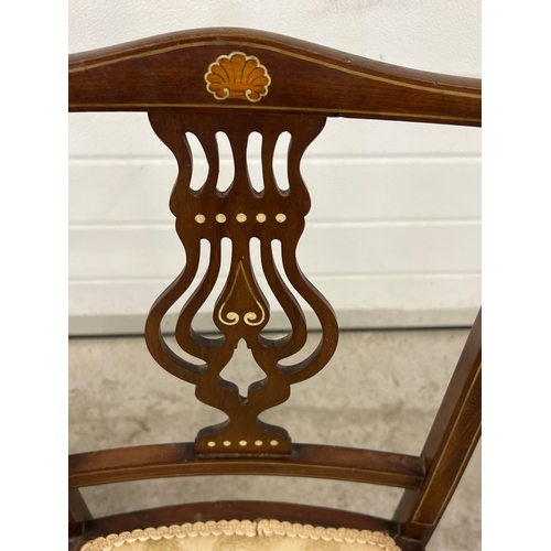 1405 - A pair of decorative Edwardian bedroom chairs with inlaid detail to backs and turned front legs. Cre... 