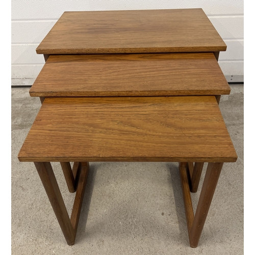 1411 - A vintage mid century teak nest of 3 tables, approx. 48.5cm tall x 58.5cm wide.