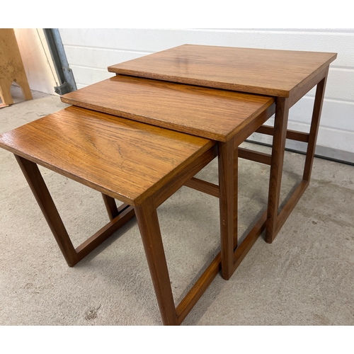 1411 - A vintage mid century teak nest of 3 tables, approx. 48.5cm tall x 58.5cm wide.