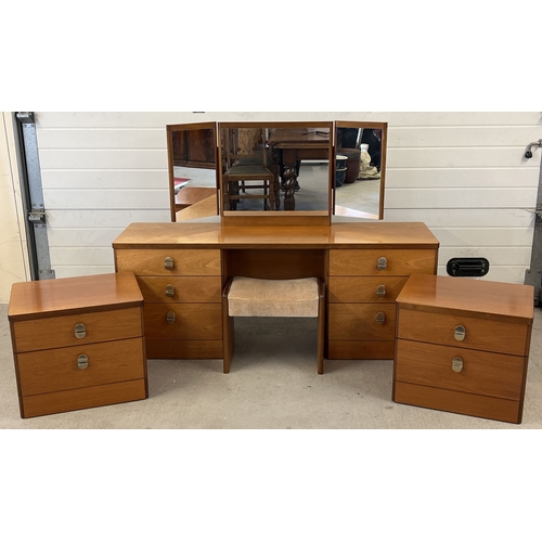 1414 - A pair of Stag mid century teak bedside cabinets together with a matching mirror backed dressing tab... 