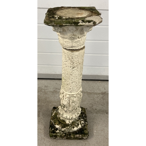 1370 - A vintage concrete garden pedestal base with figural detail. Approx. 75cm tall.