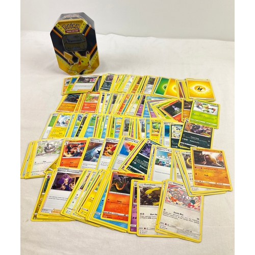 22 - 225 assorted Pokemon cards in a 2020 Pokemon V Powers Pikachu V octagonal shaped tin. Cards comprise... 