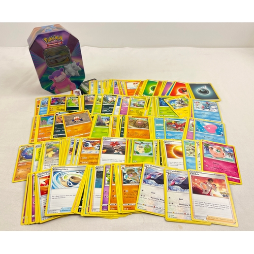 26 - 225 assorted Pokemon cards in a 2021 Pokemon V Forces Galarian Slowbro octagonal shaped tin. Cards c... 