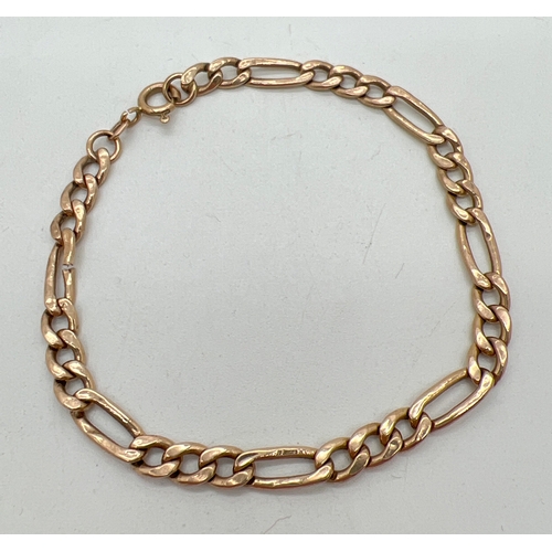 1024 - A 9ct gold 7.5 inch Figaro chain bracelet with spring clasp for scrap or repair. One link cut throug... 