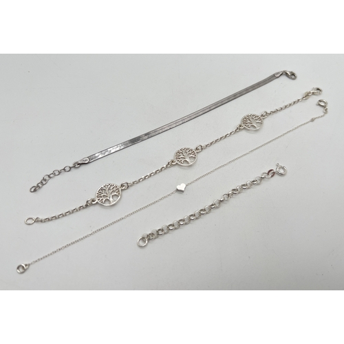 1027 - 3 silver bracelet chains together with a small belcher safety chain for bracelets. A 7