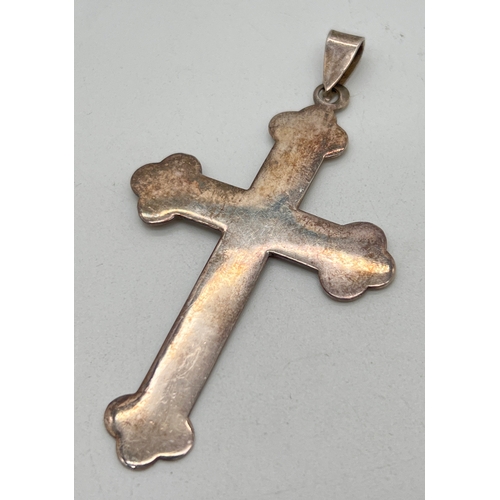 1038 - A large Royal Crown flared cross silver pendant with hanging bale. Silver mark to back. Approx. 7.5c... 