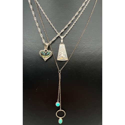 1044 - 3 silver necklaces. A Leo zodiac pendant on a 15 inch rope chain; a heart pendant set with abalone s... 