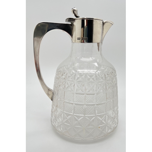 1225 - An Edwardian silver & cut glass claret jug by Mappin & Webb, London 1906. Fully hallmarked to neck a... 