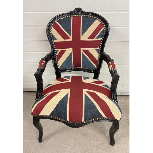 1413 - A Louis XV style reproduction armchair painted black with Union Jack design upholstered seat back an... 