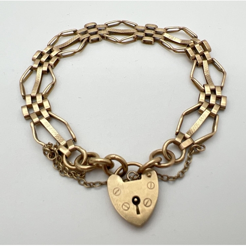A 9ct gold vintage 3 bar gate style bracelet with padlock clasp and safety chain. Gold marks to back of padlock and fixings. Slight miss-shaping to two links. Total weight approx. 13.6g.