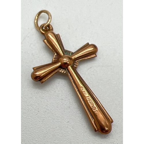 11 - A vintage 9ct rose gold cross shaped pendant with hanging bale. Approx. 3cm x 1.75cm. Hallmarks to b... 