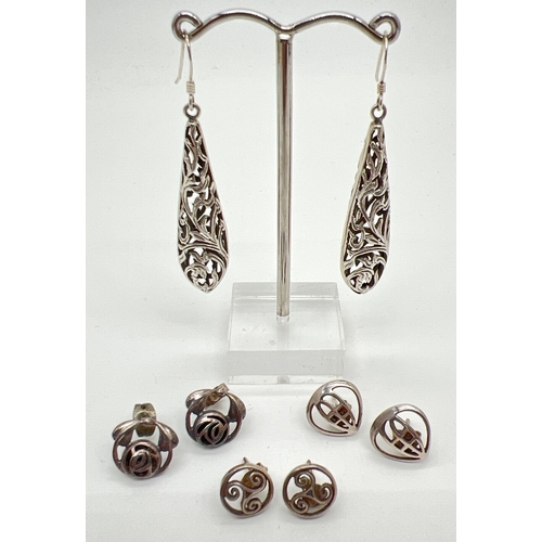 40 - 4 pairs of silver Rennie Macintoch, Celtic and floral pierced work earrings in both stud and drop st... 
