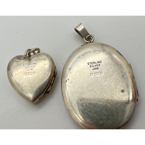 61 - 2 vintage silver lockets. An oval locket with floral engraved detail to front, together with a heart... 