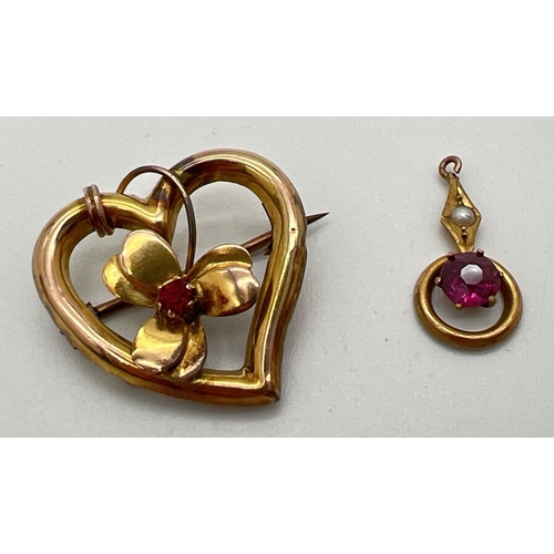 68 - 2 items of vintage gold jewellery. An Art Deco 9ct gold pendant set with a round cut ruby and a sing... 