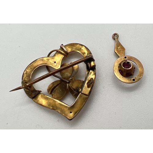 68 - 2 items of vintage gold jewellery. An Art Deco 9ct gold pendant set with a round cut ruby and a sing... 