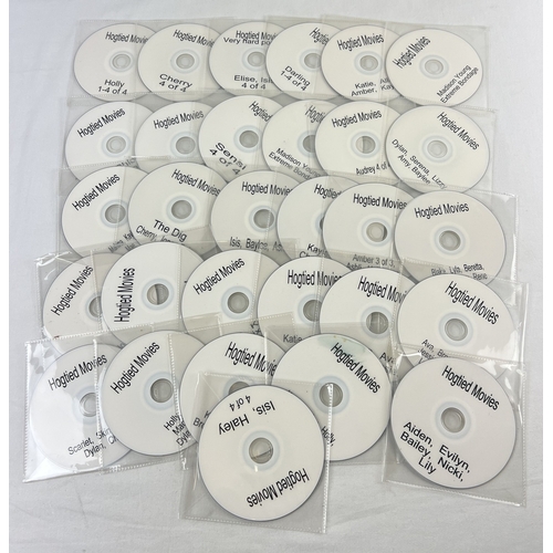48 - A collection of 30 assorted Hogtied Movies adult erotic DVD's in plastic sleeves.