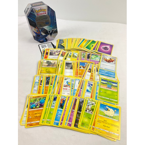 1269 - 226 assorted Pokemon cards in a 2021 Pokemon V Empoleon octagonal shaped tin. Cards comprise 201 cha... 