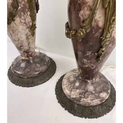 1335 - A pair of heavy 19th century French marble and cast metal urn style table lamps. Cherub and swag met... 