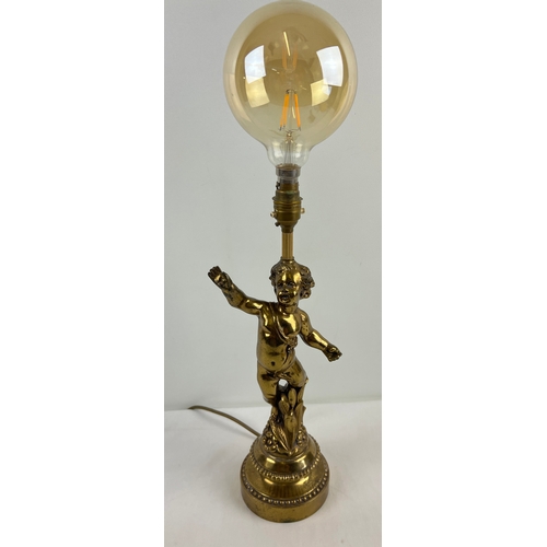 1336 - A vintage French gilt cast metal cherub table lamp. With stepped style base and floral detail. Appro... 