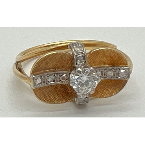 1046 - A bespoke made contemporary design yellow gold dress ring with white gold illusion cross over bands ... 