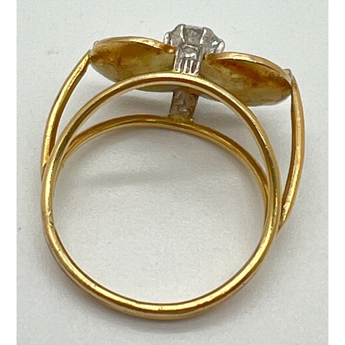 1046 - A bespoke made contemporary design yellow gold dress ring with white gold illusion cross over bands ... 