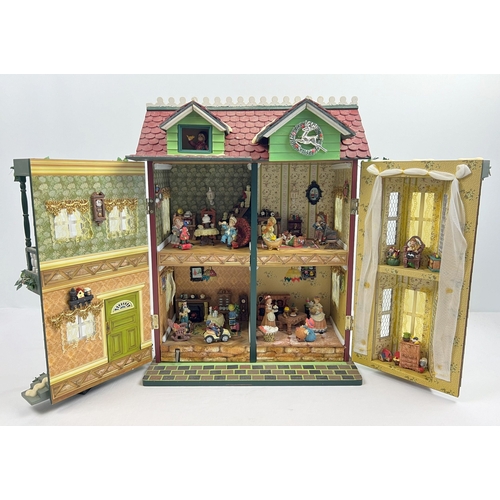 1297 - A Compton & Woodhouse battery operated 'Musical Dolls House' with lights and sounds. Lights up, figu... 