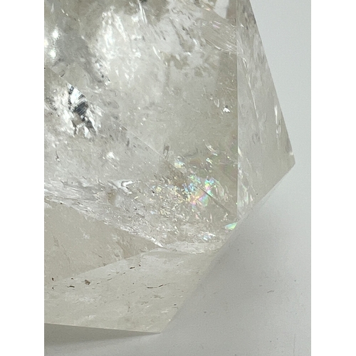 1310 - A cut and polished clear quartz icosahedron with natural galaxies and rainbow reflections. Approx. 7... 