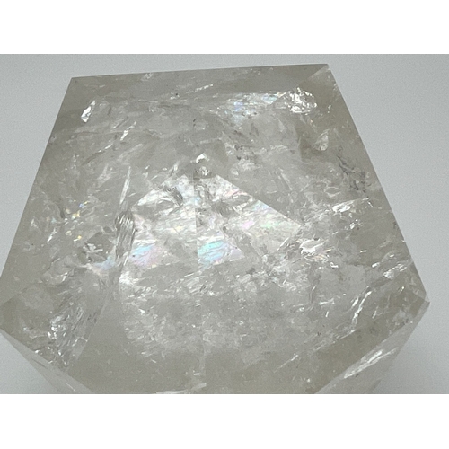 1310 - A cut and polished clear quartz icosahedron with natural galaxies and rainbow reflections. Approx. 7... 