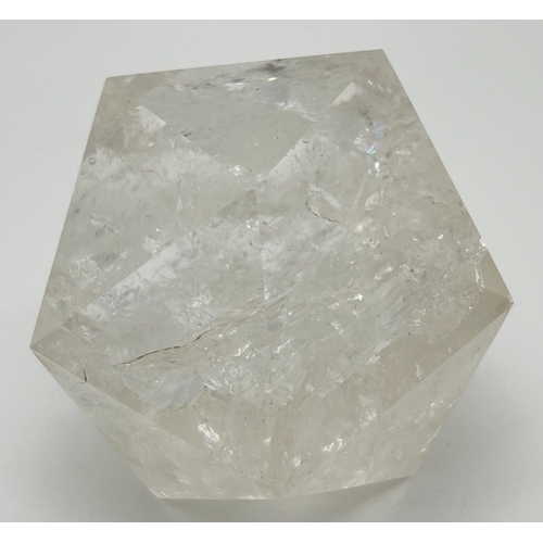 1310 - A cut and polished clear quartz icosahedron with natural galaxies and rainbow reflections. Approx. 7... 