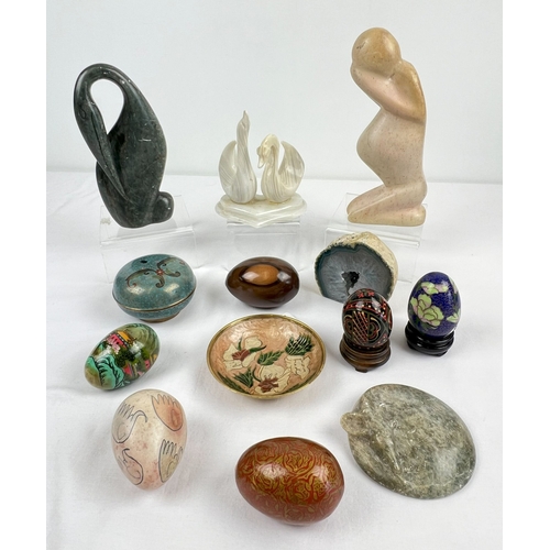 1318 - A collection of assorted natural stone, enamelled and wooden items to include carved soapstone figur... 