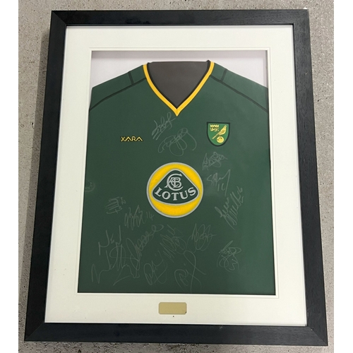 1288 - A framed and glazed signed 2004-05 Norwich City Football Club Xara training shirt with Lotus sponsor... 