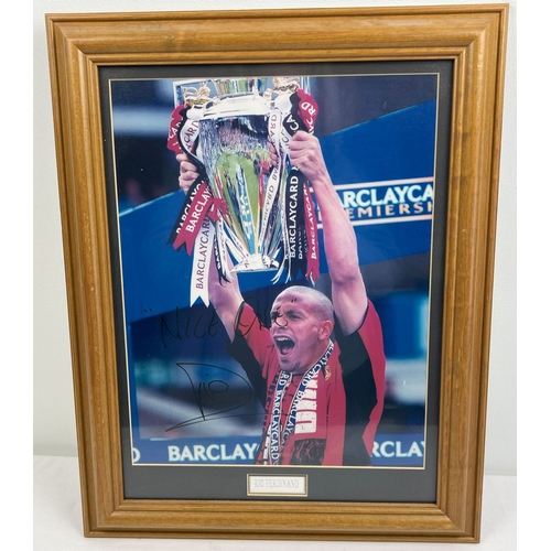 1292 - A framed and glazed signed photo of Rio Ferdinand, 