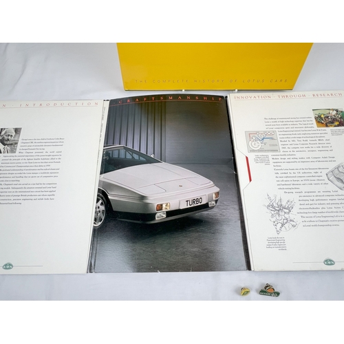 1293 - The Lotus Book: A Complete History of Lotus Cars, 50th anniversary special, signed by Chief Executiv... 