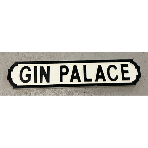 1325 - A modern painted wood 'Gin Palace' sign, in the style of an old street sign. Approx. 65cm long.