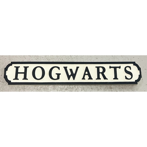 1326 - A modern painted wood Harry Potter 'Hogwarts' sign, in the style of an old street sign. Approx. 78cm... 